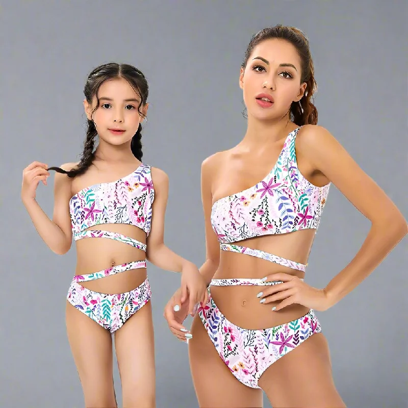 Chic Tropical One-Shoulder Ruffle Swimsuit Set for Mother and Daughter Vibrant Floral Pattern with Comfort Stretch Bold Swimsuit Design Chic Tropical One-Shoulder Ruffle Swimsuit Set for Mother and Daughter Vibrant Floral Pattern with Comfort Stretch Bold Swimsuit Design